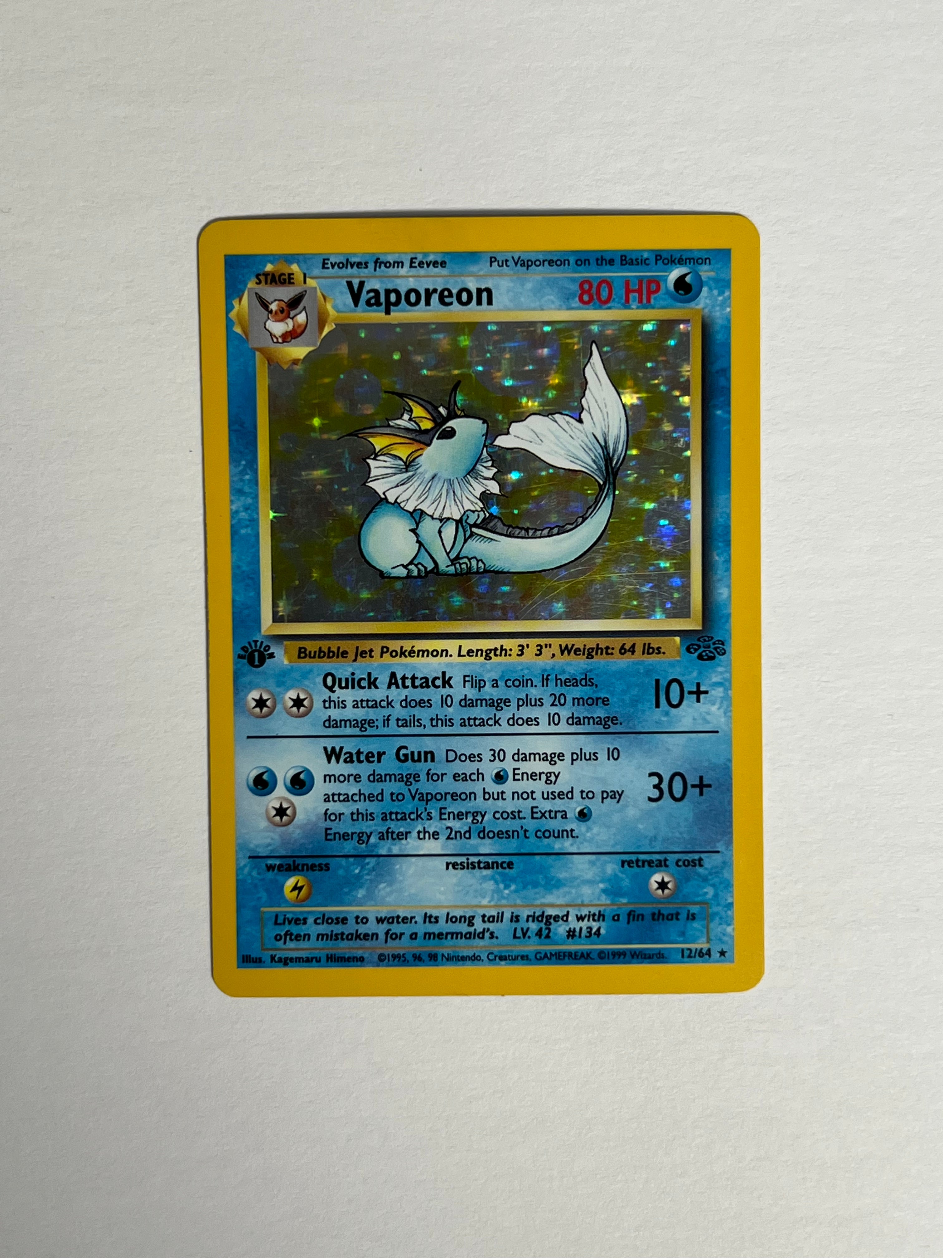 1999 Jungle Vaporeon 1st Edition Holo Light Play 12/64