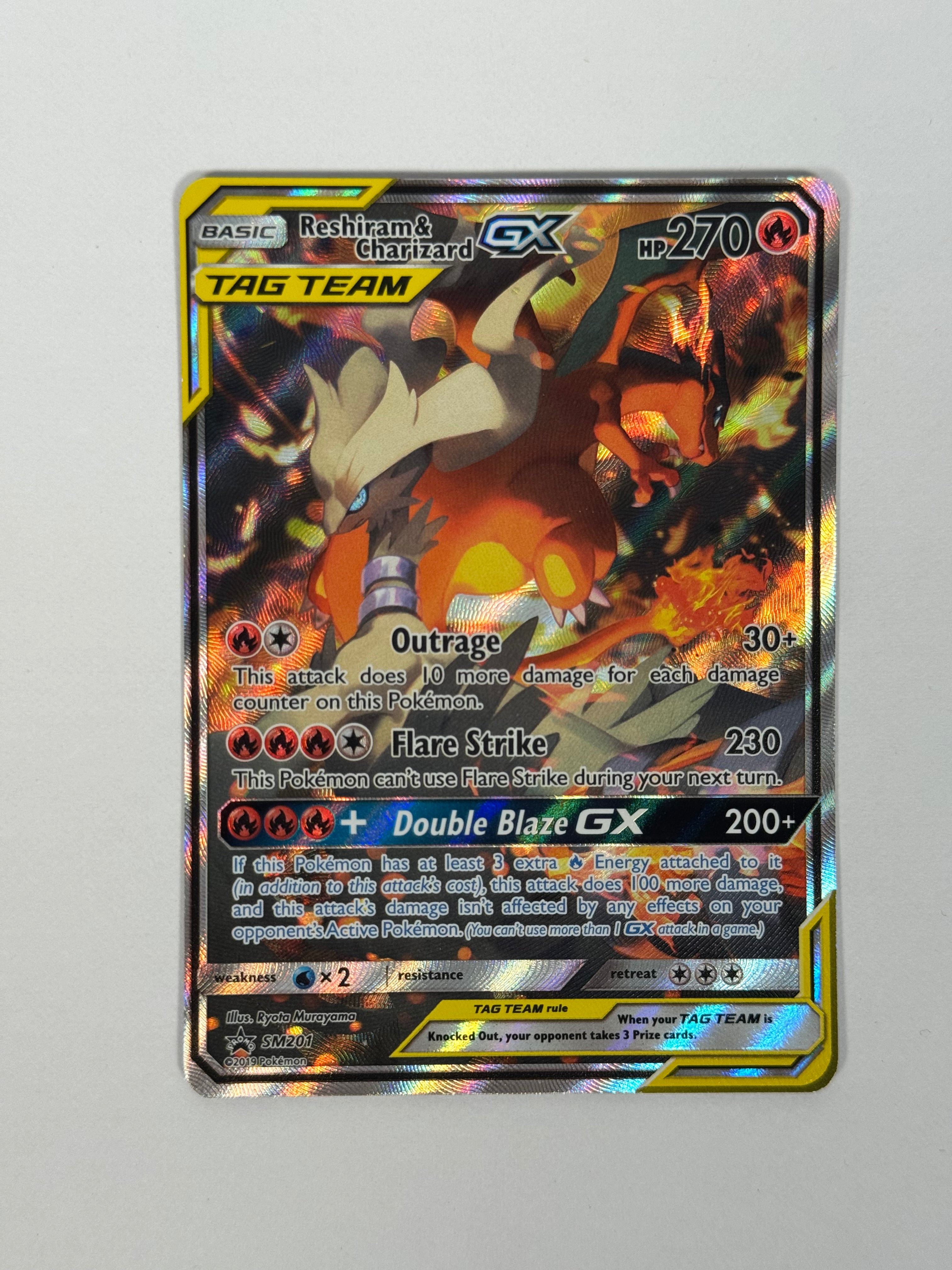 2019 Black Star Promo Reshiram & Charizard GX Tag Team SM201